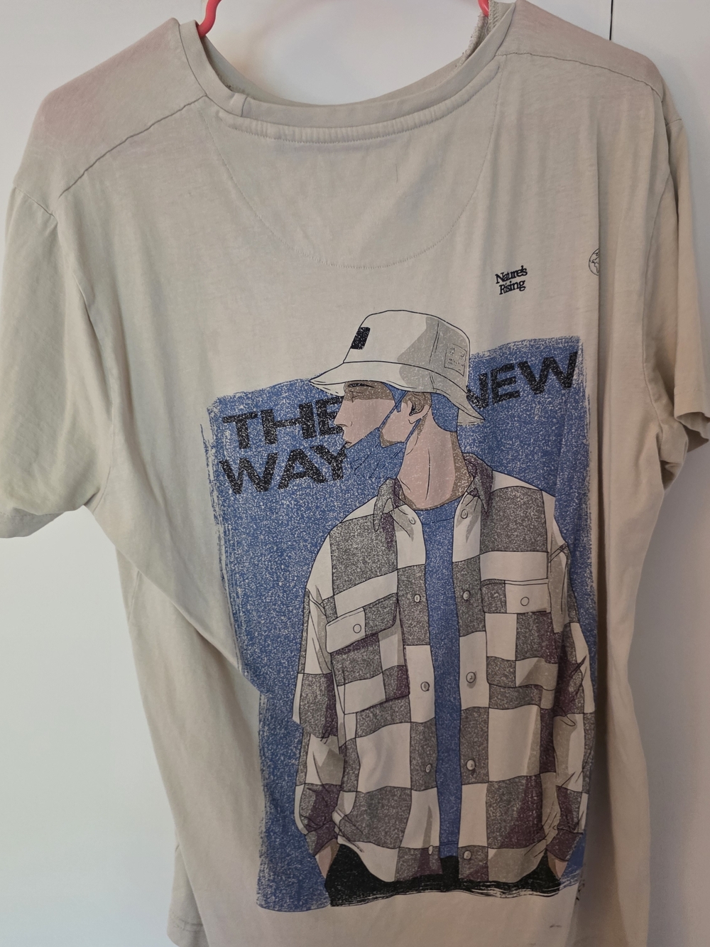 Source Unknown Cream Short Sleeve Tee with "BACKGROUND NOISE" Graphic